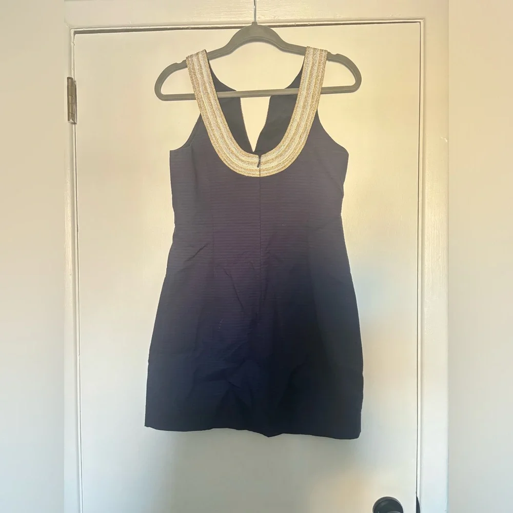 Elegant Navy Blue Dress with Gold Accents - Picture 2 of 4